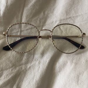 Clear sunglasses with gold trim